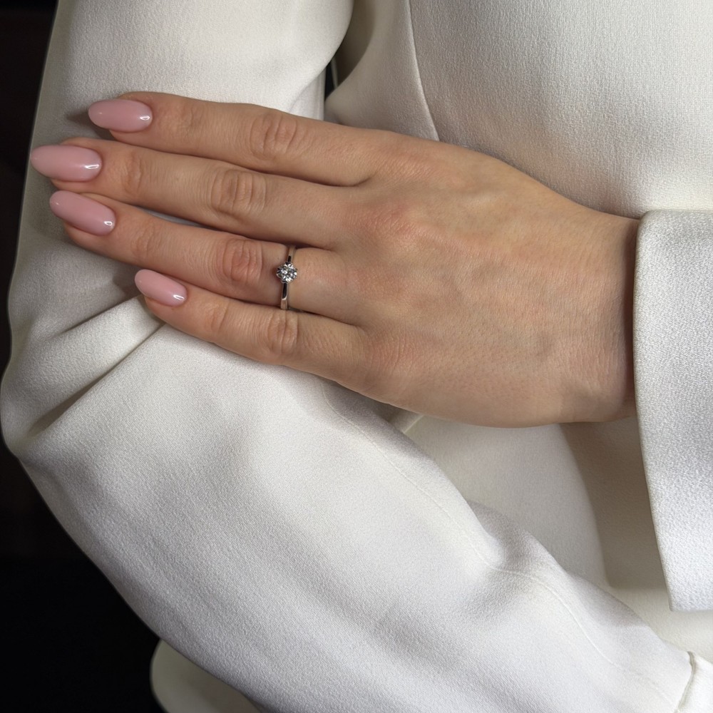 Engagement ring with brilliant "The only one 58"